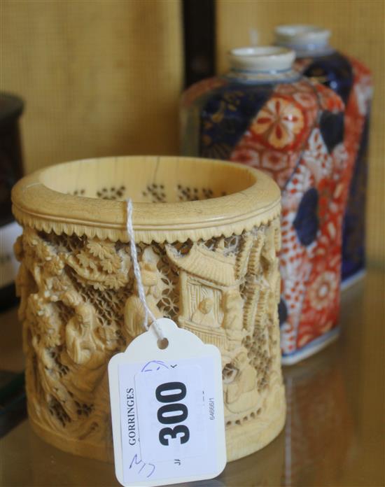 Japanese Meiji ivory tusk vase, carved with figures in pagodas & a pair of Imari small octagonal vases